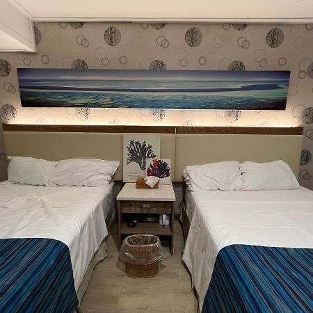 Saipan Well House Hotel Bagian luar foto